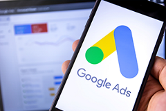 AI-in-Google-Ads photo of Google Ads logo on a smartphone screen