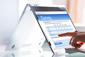 photo of a person taking an online survey